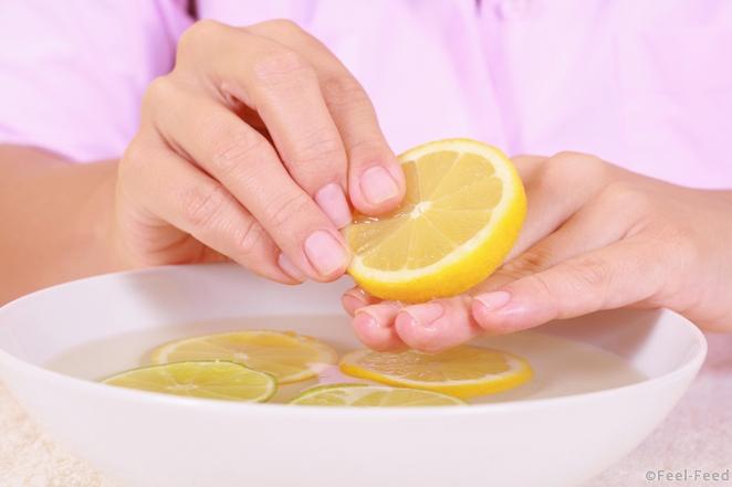 bowl of pure water with citrus fruits - hands care