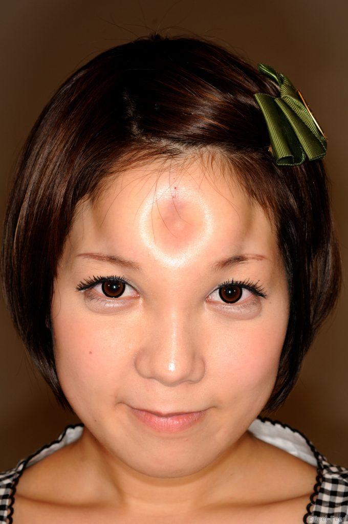Tokyo, Japan: Marin poses with her bagel head. (Photo Credit: Beyond Productions)