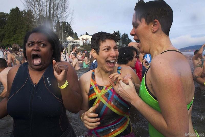 Participants react after entering Lake Washington in Seattle. (David Ryder/Reuters)