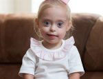 2yearold-girl-with-down-syndrome-wins-modelling-contract-thanks-to-her-cheeky-smile_1