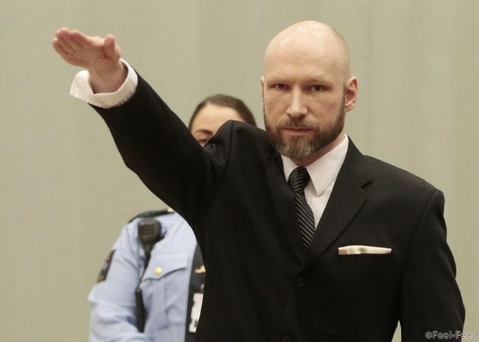WA 1 Skien - Odsúdený nórsky pravicový extrémista a masový vrah Anders Breivik si neodpustil nacistický pozdrav poèas zaèiatku odvolacieho procesu v prípade jeho údajného ne¾udského zaobchádzania vo väznici v nórskom meste Skien 10. januára 2017. Proces sa koná z bezpeènostných dôvodov v telocvièni väznice. Breivik 22. júla 2011 vo vládnej tvrti v Osle odpálil nálo, ktorá pripravila o ivot osem ¾udí. O dve hodiny neskôr postrie¾al 69 èlenov letného tábora sociálnodemokra­tickej mládee na neïalekom ostrove Utöja. V súèasnosti si vo väzení odpykáva 21-roèný trest s monosou jeho predåenia a na doivotie. FOTO TASR /AP Anders Behring Breivik raises his right hand at the start of his appeal case in Borgarting Court of Appeal at Telemark prison in Skien, Norway, Tuesday, Jan. 10, 2017. Norwegian mass murderer Anders Behring Breivik walked quietly into a courtroom at a high security prison Tuesday, making a neo-Nazi salute, as judges began reviewing a government appeal against a ruling that his solitary confinement was inhumane and violated human rights. (Lise Aaserud/NTB Scanpix via AP) *** Local Caption *** hajlovanie