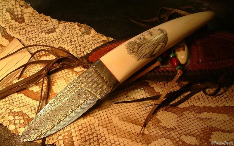 creative-wallpaper-a-knife-with-a-picture-of-an-indian-on-the-handle-100727