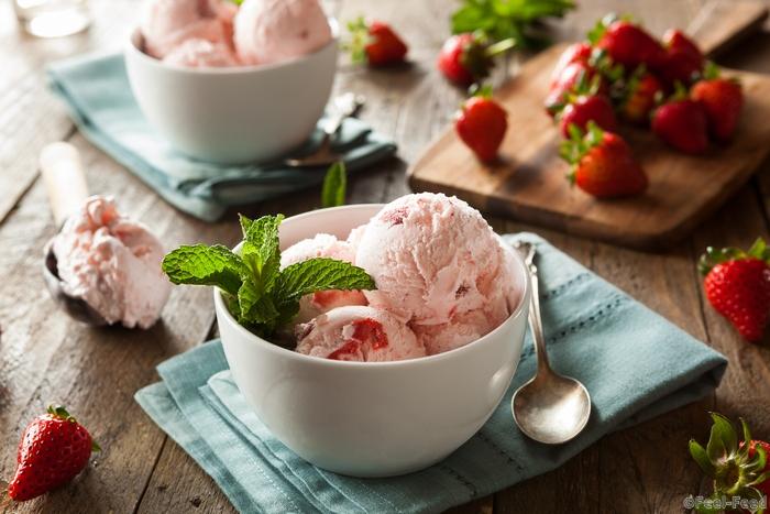 Cold Strawberry Ice Cream in a Bowl with Mint