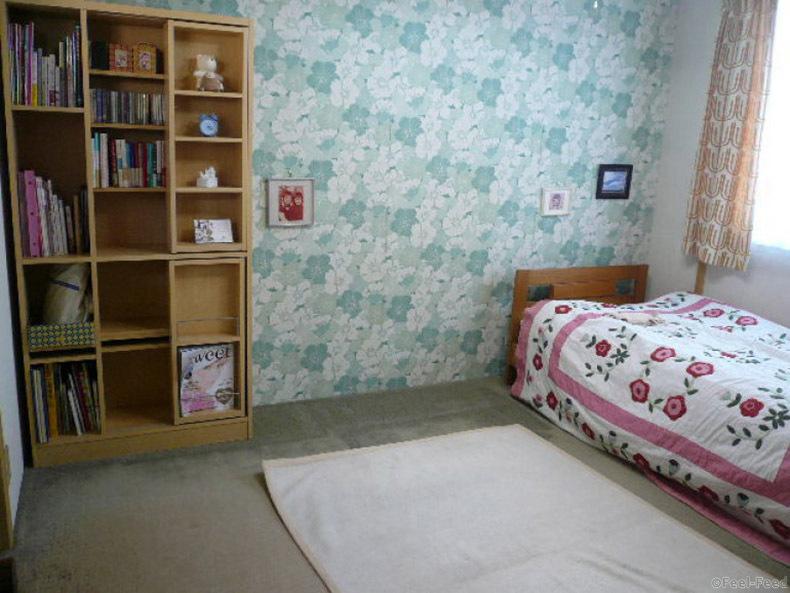 This undated photo provided by Ten Speed Press shows the aftermath of a client's room that was decluttered by Marie Kondo in Japan. Kondo is the author of the book, "The Life - Changing Magic of Tidying Up," published by Ten Speed Press. (AP Photo/Ten Speed Press)