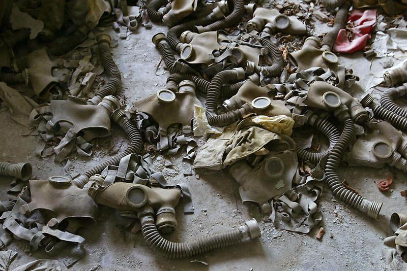 Abandoned gas masks lay on the floor in a class room in a school 26 May 2003 of the deserted town of Prypyat, adjacent to the Chernobyl nuclear site. AFP PHOTO/ SERGEI SUPINSKY