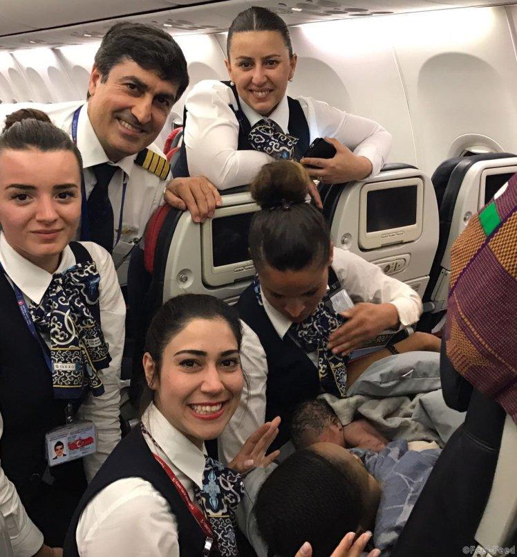 Flight crew with the mother and newborn baby. A passenger jet landed with an extra person on-board when a lady gave BIRTH at 42,000ft. See SWNS story SWBIRTH; Nafi Diaby suddenly went into labour while flying from Conakry, Guinea, to Ouagadougou in Burkina Faso. And cabin crew on-board the Turkish Airlines flight demonstrated their excellent customer service by successfully delivering a little girl, named Kadiju. Mother and baby were taken to hospital when the Boeing 737-900 type aircraft landed in the West African nation to be kept under observation. Turkish Airlines Ouagadougou station officials reported that the baby and the mother currently do not have any health problems.