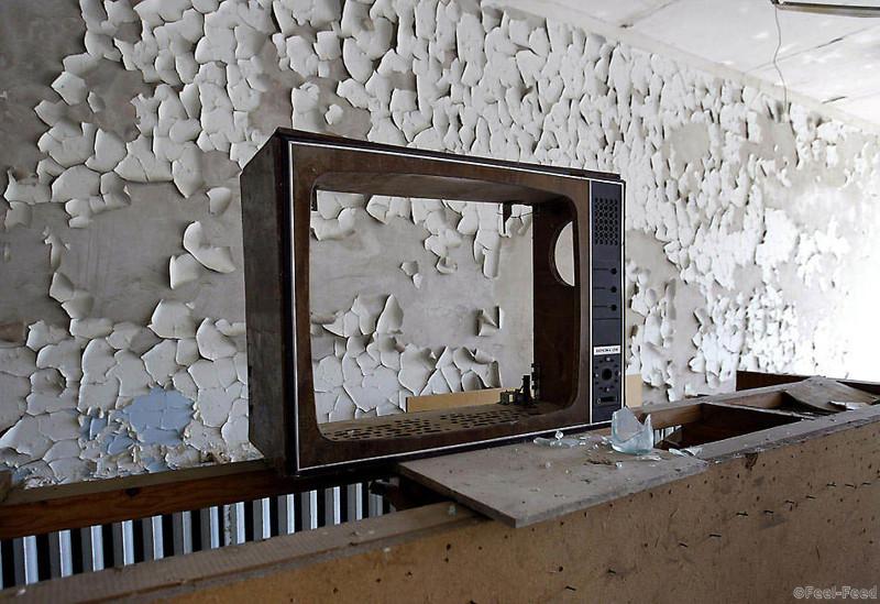 A body of TV receiver sits 26 May 2003 in hotel room in a hotel of the ghost town of Prypyat, adjacent to the Chernobyl nuclear site. AFP PHOTO/ SERGEI SUPINSKY