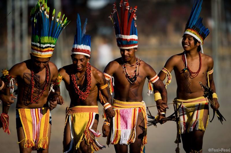 Brazilian natives of the Pareci tribe dance before playing head football with a hand-made ball, during the first day of the International Games of Indigenous Peoples, in Cuiaba, state of Mato Grosso, on November 10, 2013. 1500 natives from 49 Brazilian ethnic groups and from another 17 countries are gathering in Cuiaba until November 16 to compete in some 30 athletic disciplines, many of their own. AFP PHOTO / Christophe SimonCHRISTOPHE SIMON/AFP/Getty Images