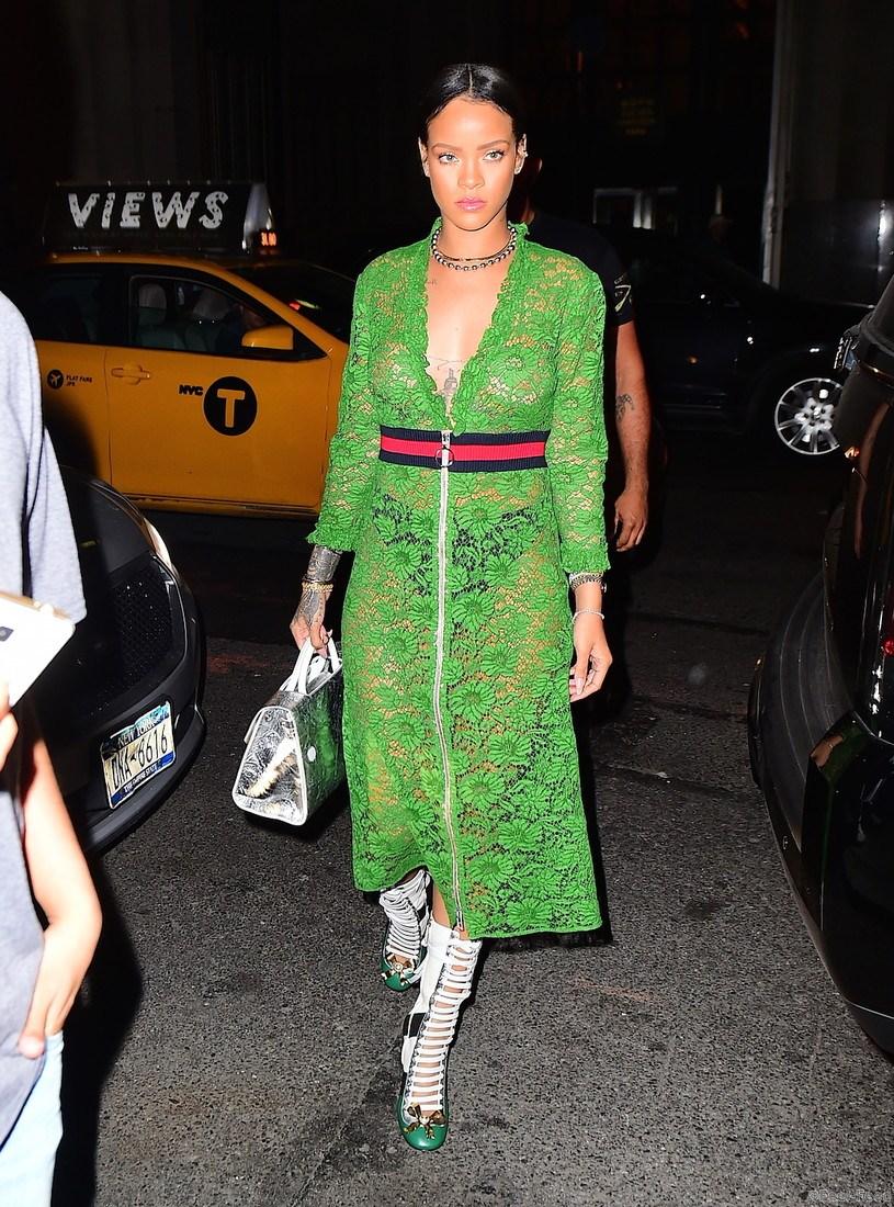 Rihanna was spotted out in NYC on Wednesday night, wearing a $3500 Gucci SS16 Green Lace Dress. She left her bra at home, showing off her perfect figure , and her nipples , as she headed to the Edition Hotel. She finished her look with Gucci Boots, and her hair pulled back in a bun. She strutted confidently for the cameras , as a Taxi drove behind her, with an ad for Rumored flame, Drake's new album, "Views". Pictured: Rihanna Ref: SPL1291214 250516 Picture by: 247PAPS.TV / Splash News Splash News and Pictures Los Angeles: 310-821-2666 New York: 212-619-2666 London: 870-934-2666 photodesk@splashnews.com 