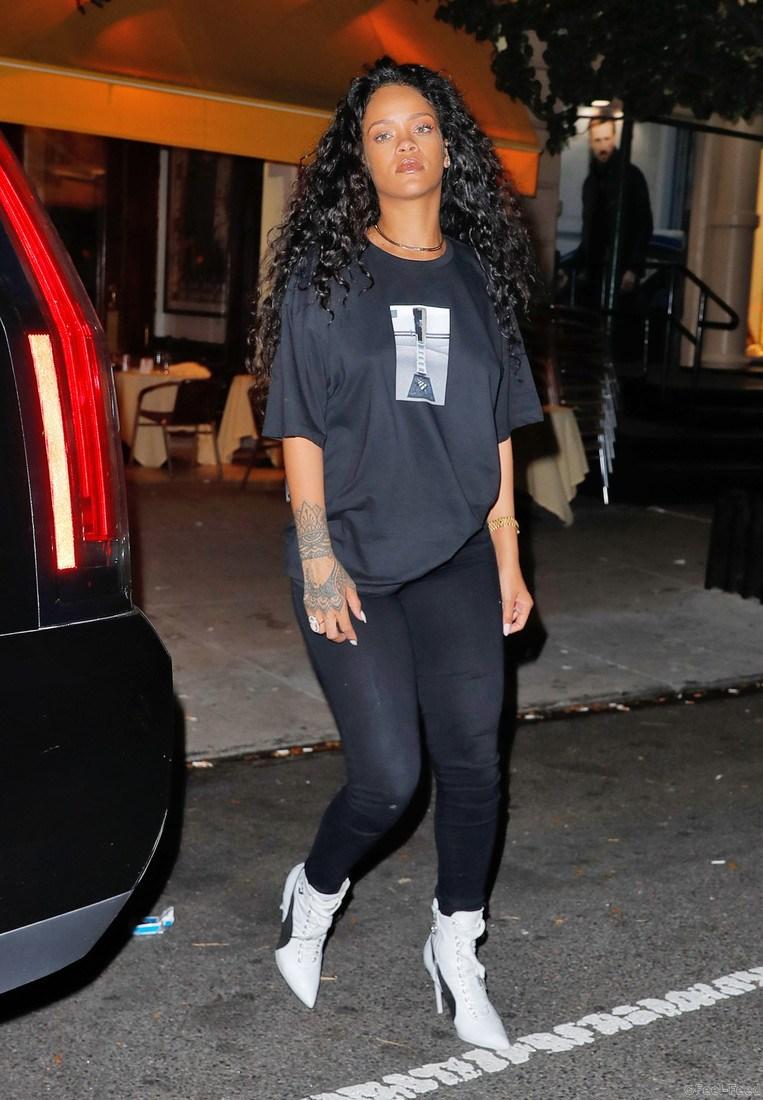 Rihanna out and about in a casual black outfit paired with white mini boots partying at Cipriani in New York City, NY, USA. Pictured: Rihanna Ref: SPL1378236 211016 Picture by: Jackson Lee / Splash News Splash News and Pictures Los Angeles: 310-821-2666 New York: 212-619-2666 London: 870-934-2666 photodesk@splashnews.com 