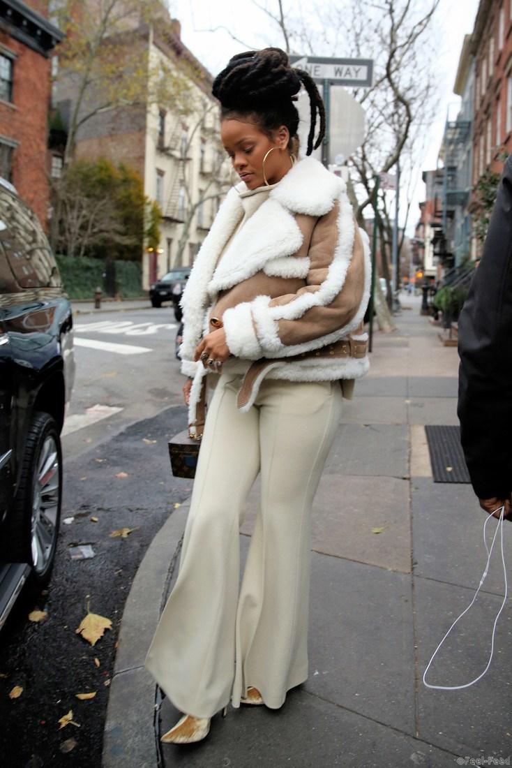 Singer Rihanna,, wearing lambswool jacket, Louis Vuitton bag and white pants, leaves her apartment in New York City Pictured: Rihanna Ref: SPL1405627 061216 Picture by: Christopher Peterson/Splash News Splash News and Pictures Los Angeles: 310-821-2666 New York: 212-619-2666 London: 870-934-2666 photodesk@splashnews.com 