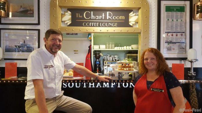 Bob Higginson and Hayley Johnson at their steamship themed coffee shop in Brixham, Devon. See SWNS story SWCOFFEE; The owner of a posh coffee shop has sparked outrage - by banning all CHILDREN under twelve. Bob Higginson, 61, threw open the doors to his ocean liner-themed coffee shop only a month ago. Serving posh teas, coffees and homemade cakes, The Chart Room, in Brixham, Devon, is themed around early 20th Century steamship travel. And Mr Higginson, a former head waiter aboard the Queen Elizabeth 2 ocean liner, decided he would welcome dogs to his eatery but requested no children under the age of 12 came to visit.