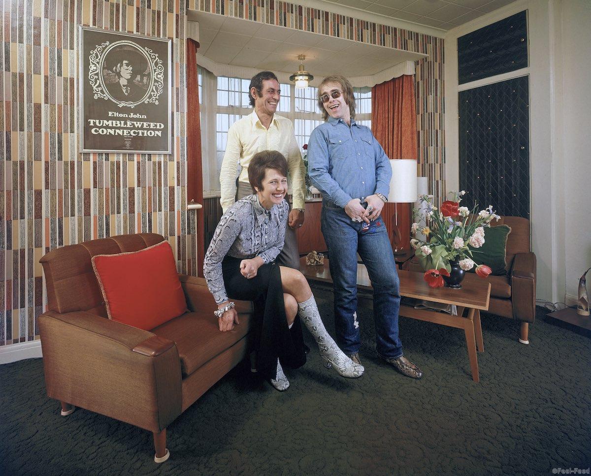 UNITED KINGDOM - CIRCA 1971:  Rock musician Elton John (R) sharing a laugh w. his mother Shelia (L) and stepfather Fred Fairebrother (C) in their apartment.  (Photo by John Olson/The LIFE Picture Collection/Getty Images)