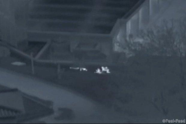 This screengrab made from video footage released by the United Nations Command on November 22, 2017 shows a North Korea defector (L) being pulled to safety by two South Korean soldiers who crawled to reach him just south of the military demarcation line in the Demilitarized Zone (DMZ). Dramatic footage of a North Korean soldier's defection released on November 22 showed him racing across the border under fire from former comrades, and then being hauled to safety by South Korean troops. The defector, who ran across the border at the Panmunjom truce village on November 13, was shot at least four times and has been recovering in a South Korean hospital. / AFP PHOTO / UNITED NATIONS COMMAND / Handout / RESTRICTED TO EDITORIAL USE - MANDATORY CREDIT "AFP PHOTO / UNITED NATIONS COMMAND (UNC)" - NO MARKETING NO ADVERTISING CAMPAIGNS - DISTRIBUTED AS A SERVICE TO CLIENTS HANDOUT/AFP/Getty Images