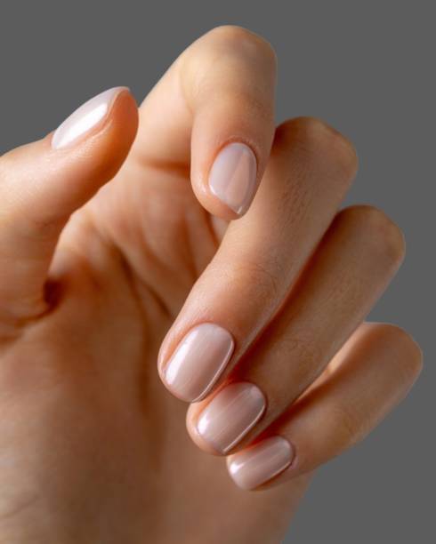 New and modern hand nail manicure with different modern and innovative shapes and drawings with artificial nails _ Nail trimming, manicure, personal care, skin and body care